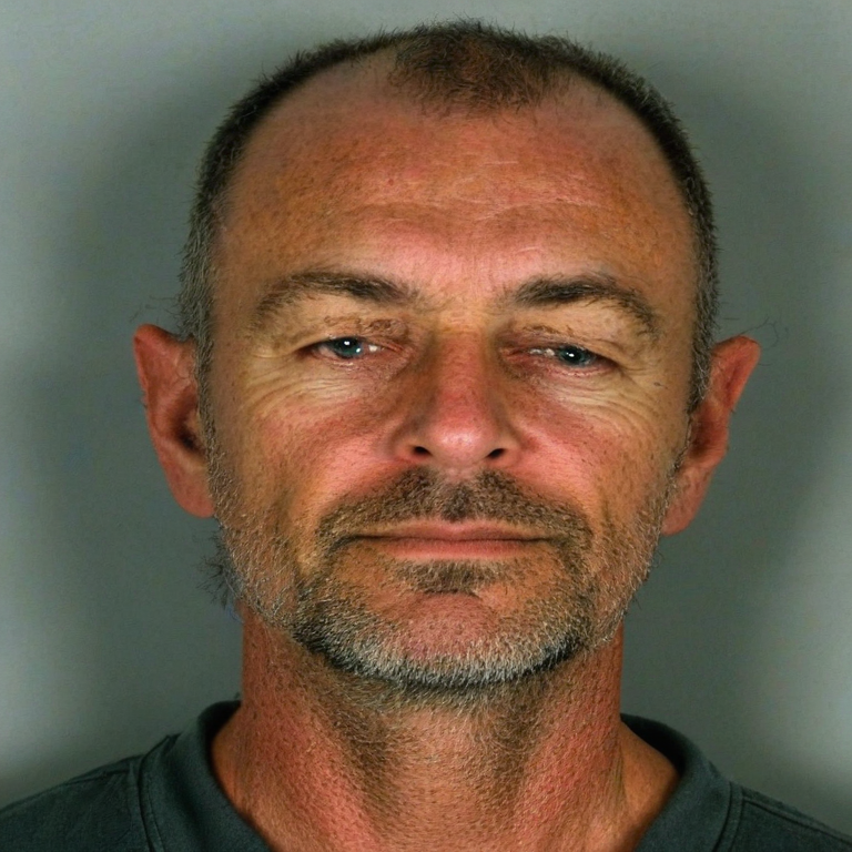 front shot, mugshot photo of a Caucasian man 50 yo  looks at viewer, cinematic shot